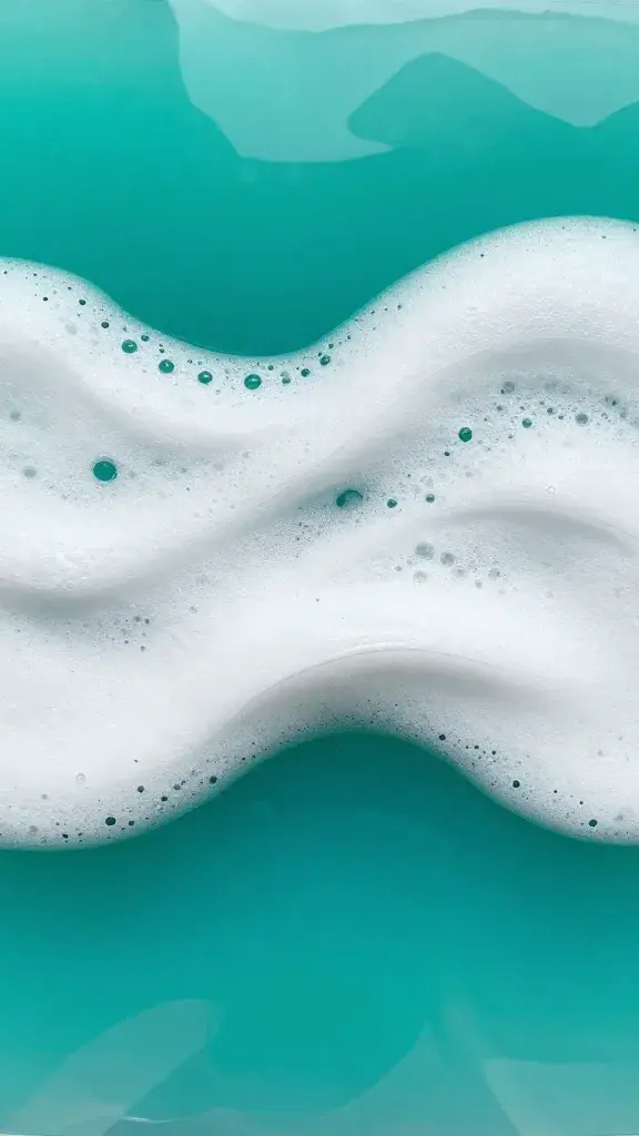 White foam wave pattern in turquoise resin art